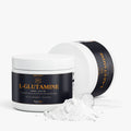 L-Glutamine powder with container and scoop on a white background